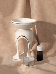 Aroma lamp, evening Spa treatments, aromatic oil for relaxation, brown background