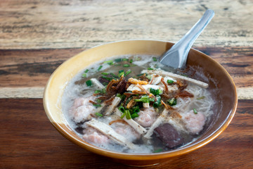 Eating Paste of rice flour on a wooden table detail food