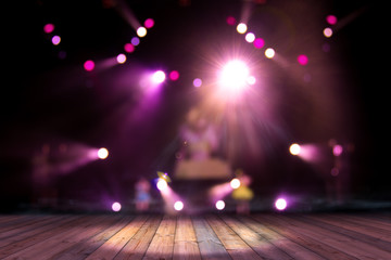 top wood desk with light bokeh in concert blur background,wooden table