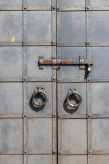 Close-up of the old iron black door