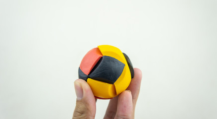 Colorful rubber puzzle ball isolated on white background.