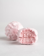 Tasty and fluffy russian marshmallow zephyr closeup view on white background