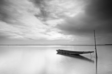 Sunrise at Pantai Jubakar Tumpat Kelantan Malaysia with fisherman boat 