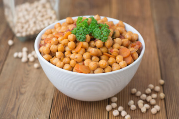 Cooked Chickpeas. Healthy food nutritious food. Vegetarian food over wooden board.