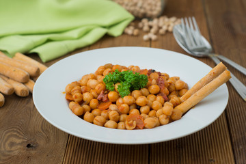 Cooked Chickpeas. Healthy food nutritious food. Vegetarian food over wooden board.