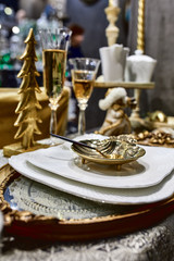 a showcase with the laying of porcelain dishes. Beautiful merchandising, dishes for restaurants and hotels