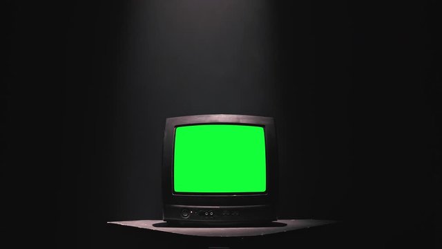Vintage 80S Tv With Green Screen. Iron Tone. Ready to replace green screen with any footage or picture you want.