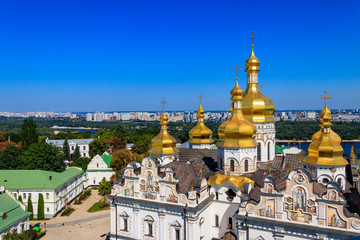 View of Dormition Cathedral of the Kyiv Pechersk Lavra (Kiev Monastery of the Caves) and the Dnieper river in Ukraine. View from Great Lavra Bell Tower