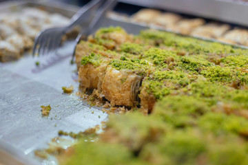 Pistachio Turkish Baklavas in a shop on a tray