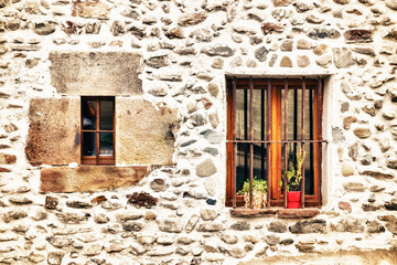 Stone wall with wooden window