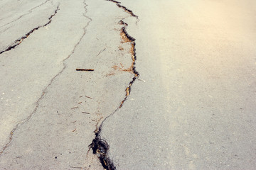 Road collapsed and subsidence cracking.