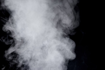 Abstract  powder or smoke isolated on black background