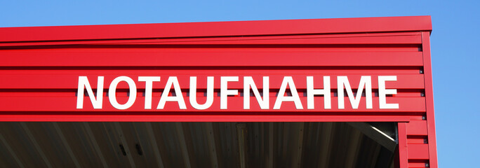 Notaufnahme means casualty or accident and emergency department in German - sign at hospital