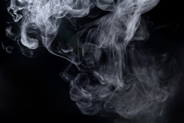 Abstract  powder or smoke isolated on black background