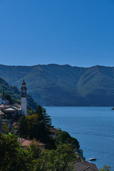 Fototapeta na wymiar Panoramic view of Lake Como. Lombardy, Italy. Autumn season. Perfect clear blue sky.
