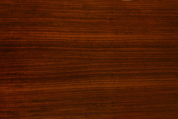 Obraz na płótnie Canvas background and texture of Walnut wood decorative furniture surface
