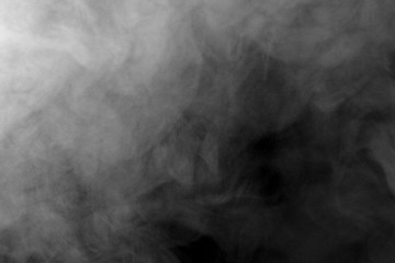 Abstract  powder or smoke isolated on black background