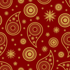 Modern Indian paisley seamless pattern vector design. Gold paisley on red background