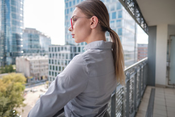 Fototapeta premium Beautiful business woman on the background of the modern office