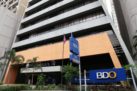 MANILA, PHILIPPINES - DECEMBER 7, 2017: BDO Bank branch in Manila, Philippines. Banco de Oro (BDO Unibank) is the largest Philippine bank by assets.
