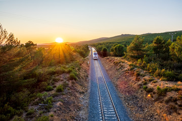 Blurred scene of motion with train at sunset