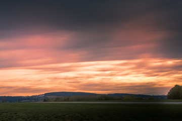 Obraz na płótnie Canvas orange sunset with clouds