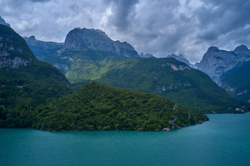 Naklejka na ściany i meble Panoramic view of the lake Molveno north of Italy. Trento region. Great trip to the lake in the Alps. Aerial photography
