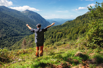 happy man hiker on the mountain