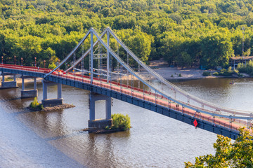 View on pedestrian bridge across the Dnieper river in Kiev, Ukraine