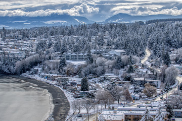 seaside city covered in snow