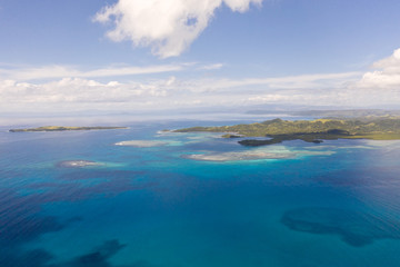 Fototapeta na wymiar Bucas Grande Island, Philippines. Beautiful lagoons with atolls and islands, view from above. Seascape, nature of the Philippines.