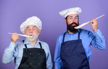 so delicious. mature senior bearded men in kitchen. new recipe. Perfect taste. Chef men cooking....