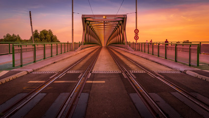 Beautiful low angle view of symmetrical tram bridge at sunset. Travel destination Slovakia, Bratislava