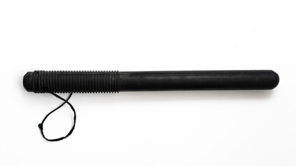 Rubber baton of a Russian policeman on a light background.