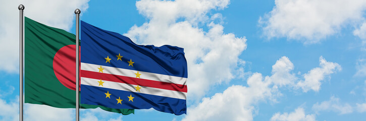 Bangladesh and Cape Verde flag waving in the wind against white cloudy blue sky together. Diplomacy concept, international relations.