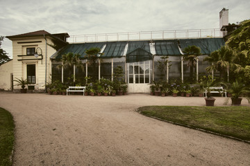 Fototapeta na wymiar Libochovice, Bohemia, Czech Republic Historic greenhouse in the palace garden.