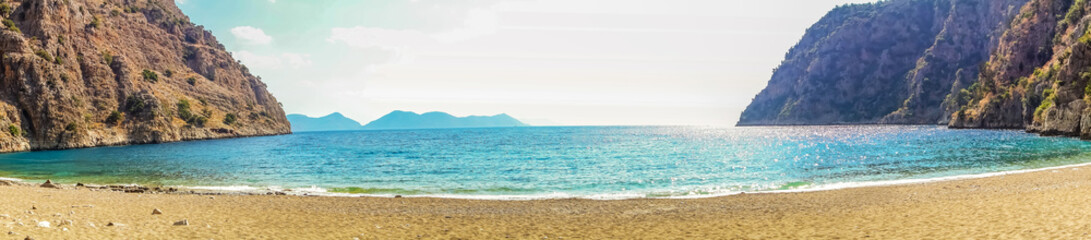 Panorama Mountain Oludeniz lagoon in sea Turkey mountain beach view. © Emoji Smileys People