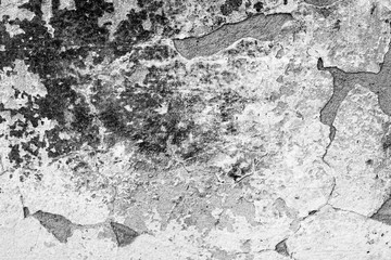 Texture of a concrete wall with cracks and scratches which can be used as a background
