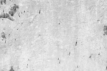 Texture of a concrete wall with cracks and scratches which can be used as a background