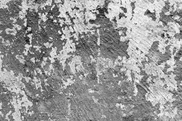 Texture of a concrete wall with cracks and scratches which can be used as a background