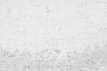 Texture of a concrete wall with cracks and scratches which can be used as a background