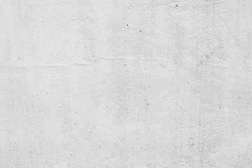 Texture of a concrete wall with cracks and scratches which can be used as a background