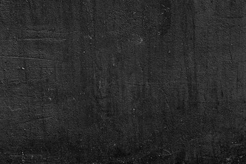 Texture of a concrete wall with cracks and scratches which can be used as a background