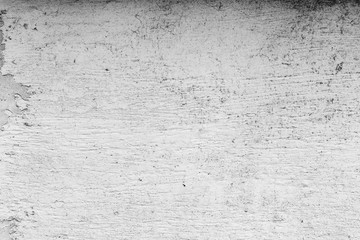 Texture of a concrete wall with cracks and scratches which can be used as a background
