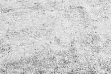 Texture of a concrete wall with cracks and scratches which can be used as a background