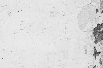 Texture of a concrete wall with cracks and scratches which can be used as a background