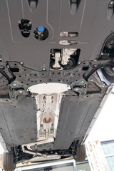 car chassis down automobile view in station