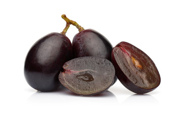 Fresh black grape isolated on white background