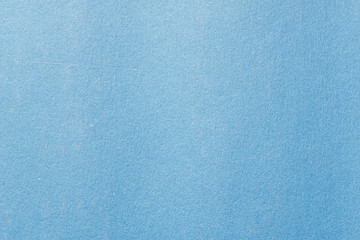 Blue color cardboard. Clean light blue paper texture. High resolution photo.