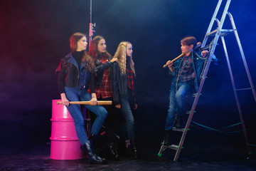 Rebel youth. Full length portrait of cocky children in stylish jeans and leather clothes. Concept...